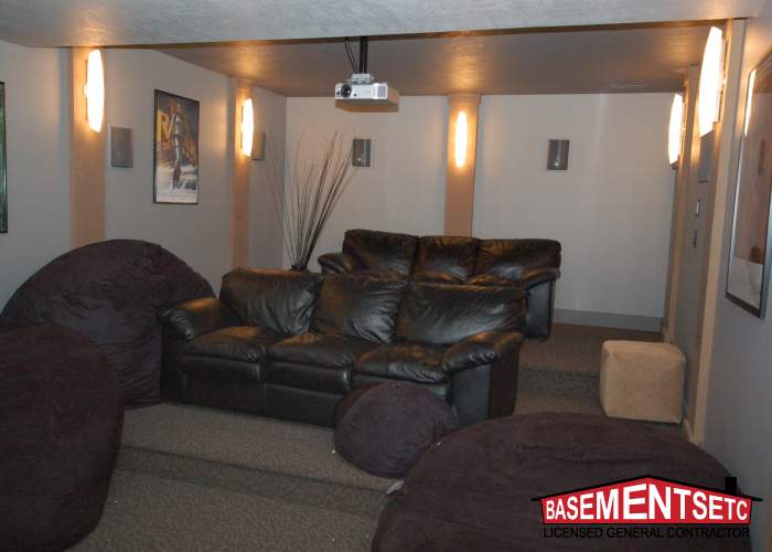 Cozy basement home theater with leather seating and bean bags