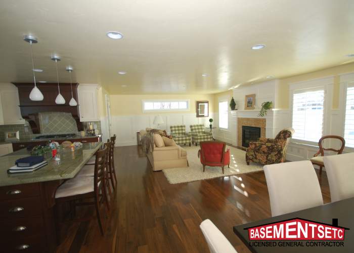 Spacious living area with modern kitchen and cozy seating arrangement