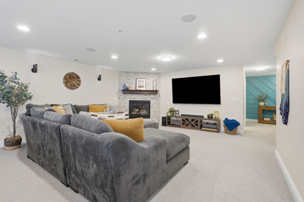 Basement Finishing with Couch and Large TV